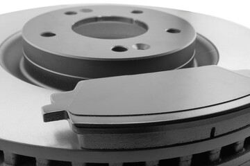 Brake discs and brake pads isolated on white background. Auto parts. Brake disc rotor isolated on...