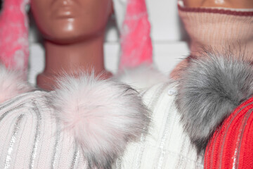 Mannequins dressed in warm clothes.