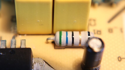 Various capacitors Focus on first floor Circuit board power supply with electrical components