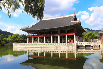 Gyeonghoeru Pavilion and pond, Gyeongbokgung palace complex, Seoul, South Korea. Beautiful landscape with lake, mountains and Gyeonghoeru Pavilion, Gyeongbokgung Palace, Seoul, Republic of Korea