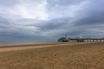 view of the ferris wheel on the beach of the Hague Netherlands North Sea