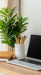 Fototapeta premium A serene workspace with greenery a laptop stationery and a touch of nature for creative productivity