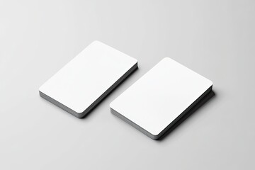 Naklejka premium White blank business card mockup on a gray background, 3D rendering. Two cards with rounded corners, a mock-up template for design presentation of products or services