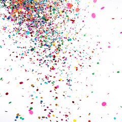 Flying colorful confetti in the air on the white background. Concept of happy birthday, party and holidays isolated on a white background
