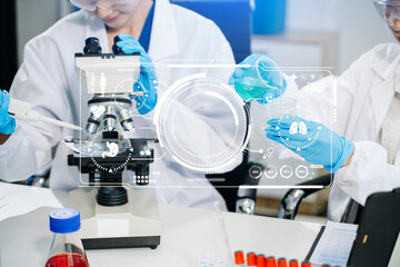 Fototapeta premium Asian Female Scientists Conducting Chemistry Research in Laboratory