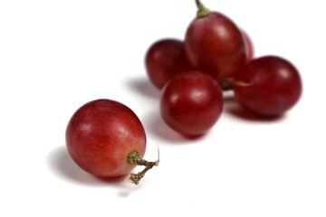 red grapes isolated on white