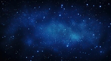 Naklejka premium Blue night sky with scattered stars.