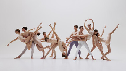 Group of ballet dancers in abstract formation, blending strength and flexibility. Men and women dancing with grace. Depth of contemporary dance. Concept of art, classical dance, performance, theater