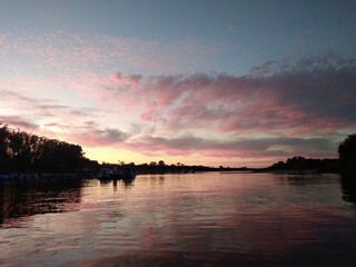 Obraz premium sunset over the river