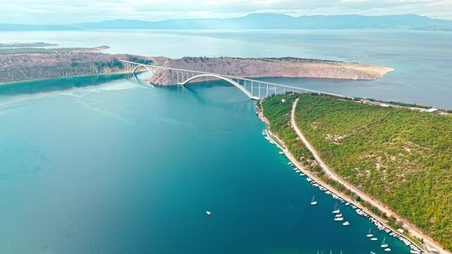 Aerial footage of Krk bridge which connects island Krk with the mainland, Croatia