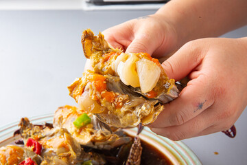 Korean-style soy sauce marinated crab with a bright gray background 밝은 회색 배경의 한국식 간장게장