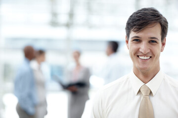 Portrait, happy and businessman in office lobby for coworking, career growth and internship opportunity. Face, smile and professional insurance consultant, entrepreneur and employee at enterprise