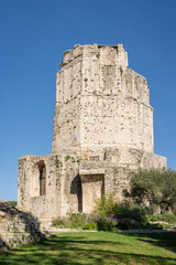 Vertical landscape view of historic landmark roman monument Magne Tower or Tour Magne in the...