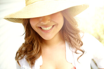 Girl, hat and outdoor smile on holiday, countryside freedom and relax in garden for peace on trip. Female person, location and happy with travel in Florence, vacation and adventure in nature for fun