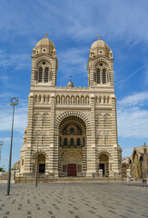 Fototapeta premium Marseille, France - March 25, 2024: View of the Cathedral Sainte-Marie-Majeure de Marseille or de la Major is a Roman Catholic cathedral, and a national monument of France, High quality photo