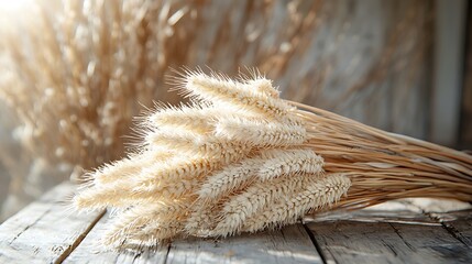 A bohemian bouquet featuring feathers and dried wheat, resting on a rustic wooden table, natural sunlight highlighting the earthy textures, soft muted colors creating a vintage feel, hd quality,
