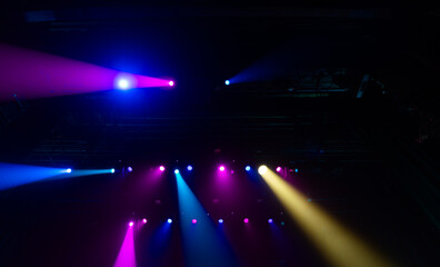 Colorful concert lights on empty stage