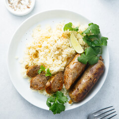 Homemade sausages with couscous