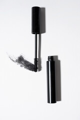 Black mascara on white background