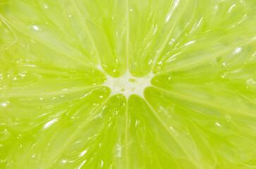Macro close up surface texture Juicy slice of lime