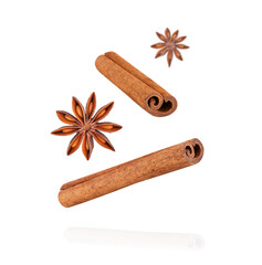 Star anise and cinnamon sticks isolated on white background. Aromatic spice for cooking and baking....