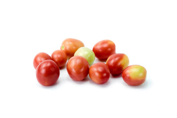 Group of fresh ripe small tomatos isolated on white background close up stack.