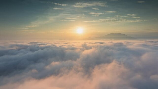 Hyperlapse aerial view drone flying over sea of fog at sunrise, Long Coc tea hill, Vietnam