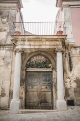 the entrance to the palace view of the town of Modica in Sicily
