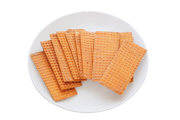Waffles with chocolate coating. Belgian dessert. Waffles in ceramic plate. Isolate on a white background.