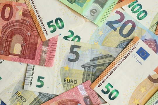 Many euro money bills. Lot of banknotes of european union currency close up