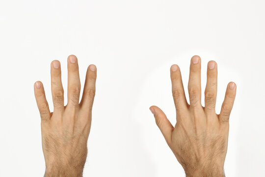 Hand of Turkish man over white isolated background, counting number 9, showing nine fingers, Space for text.
