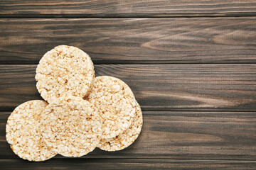 Tasty crispbread on wooden table
