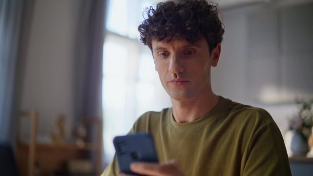 Man hands taking smartphone receive message with good news in office closeup