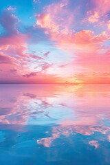 Fototapeta premium Pink and blue sunset reflected in calm water.