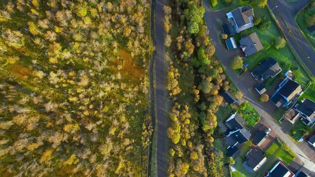 Aerial drone shot from the town called Sortland in Northern Norway during fall on a partly sunny day