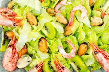 Colorful mussel and shrimp salad, close up.