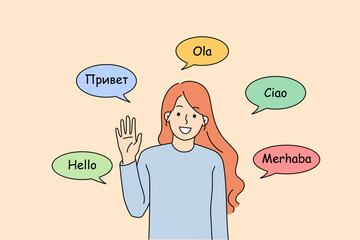 Polyglot woman says hello in different languages and waves hand in friendly manner