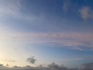 Portrait of the evening sky with clouds. A beautiful view of the natural evening sky with a...