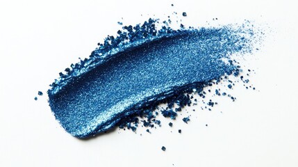 Blue glitter makeup product smear on a white surface showcasing eye shadow lip gloss and face products for festive inspired makeup swatches