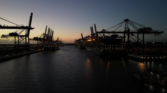 Hamburg Harbor , container terminal  with sunrise, 