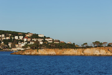 Houses on an island and other island in front of it