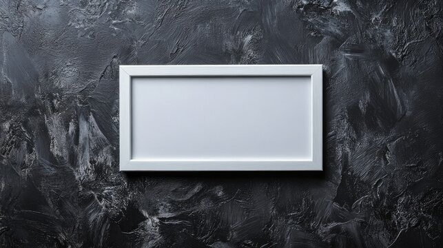 White rectangular frame isolated on a dark textured background ideal for a panoramic display featuring ample space for text