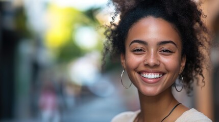 Fototapeta premium Cheerful individual smiling broadly at the camera with a joyful expression