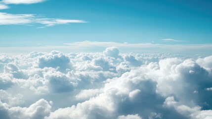 Soft focus on white clouds against a blue sky backdrop
