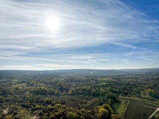 Sunny autumn sky over the forest