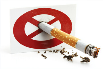 A no smoking sign with a cigarette dramatically stuck through it, conveying the message of defiance.