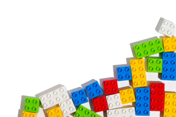 Top view of many colorful plastic blocks bricks toy for building constructions on blank png isolated background in corner. The concept of children's educational games. Place for your text and design