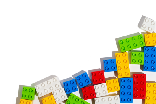 Top view of many colorful plastic blocks bricks toy for building constructions on blank png isolated background in corner. The concept of children's educational games. Place for your text and design