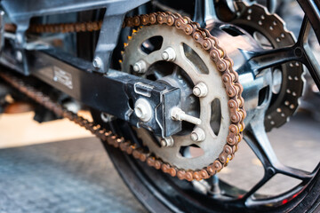 orange rust patches on motorcycle chain, Maintenance and repair motorcycle concept