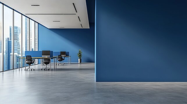 Modern blue office interior with PC computers and tables lined up on a concrete floor. Coworking space with a panoramic window offering views of Singapore skyscrapers